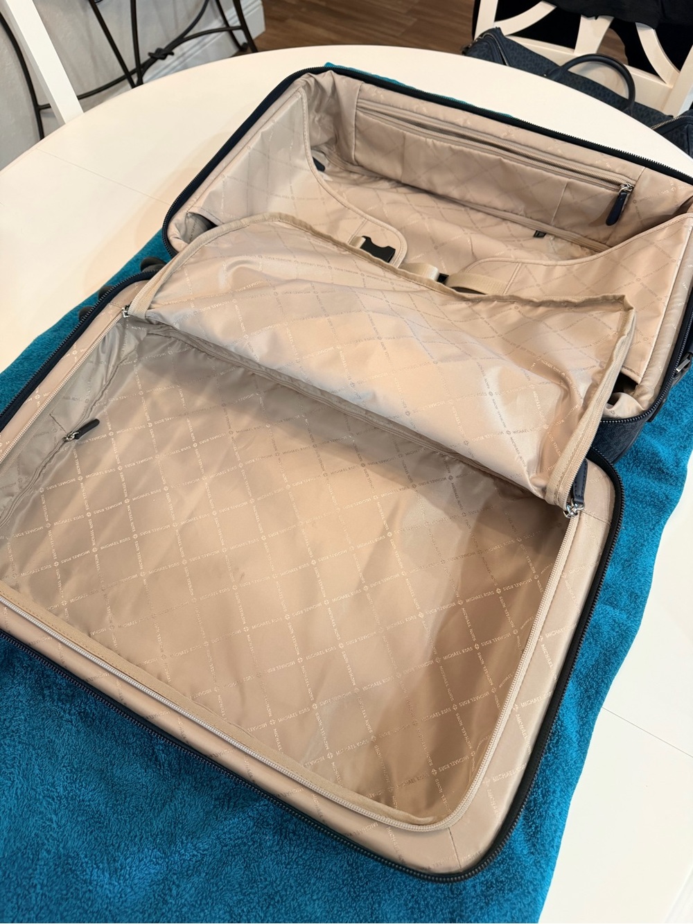 SOLD! Michael Kors Navy Monogram Spinner luggage bag - Picture 6 of 8